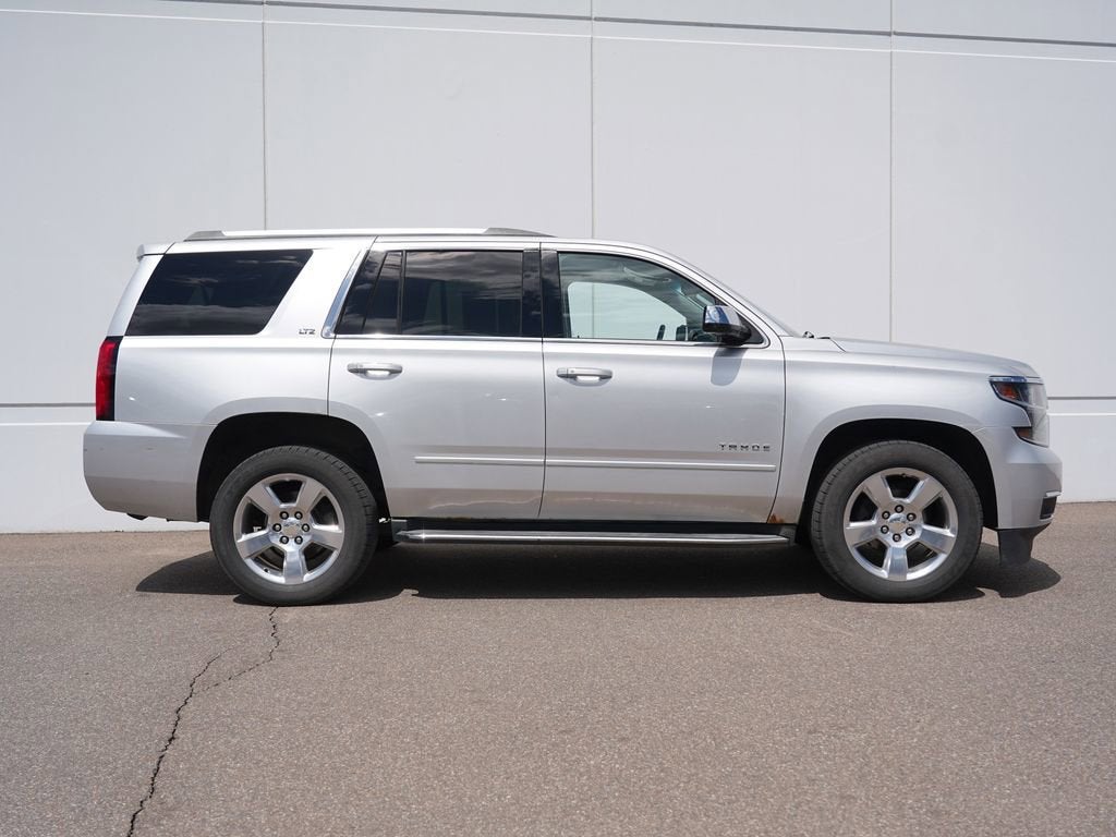 Used 2015 Chevrolet Tahoe LTZ with VIN 1GNSKCKC2FR243137 for sale in Cold Spring, Minnesota
