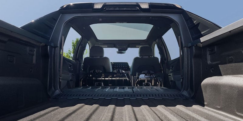 2025 Chevrolet Silverado EV view from back with tailgate down